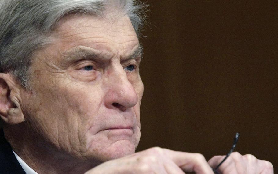 Then-Senate Armed Services Committee member Sen. John Warner, R-Va., listens to testimony on Capitol Hill in Washington on April 8, 2008. 