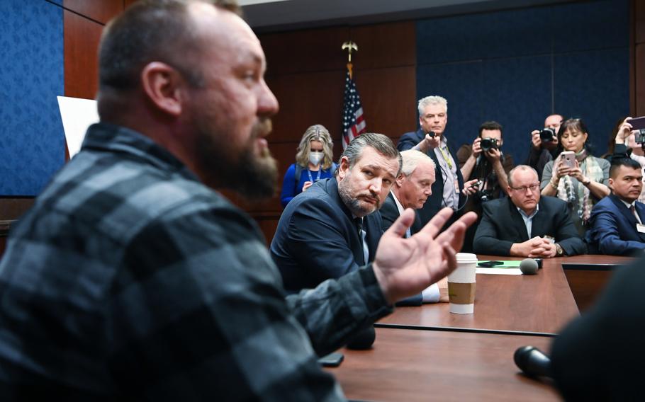 Brian Brase, left, organizer of the "People's Convoy," speaks to the media following a meeting with Sens. Ted Cruz, R-Texas, and Ron Johnson, R-Wis., on Tuesday. 