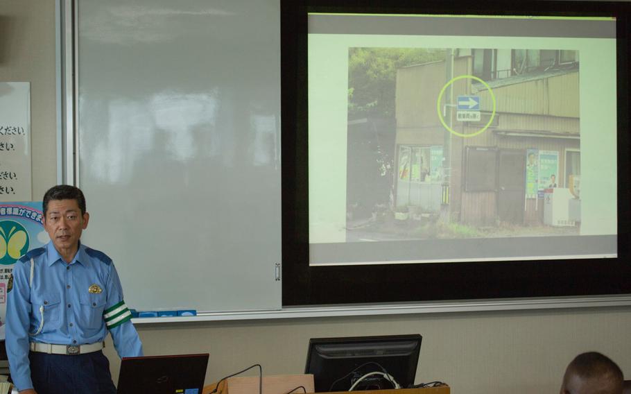 An Iwakuni City police officer gives a class on common traffic errors in Iwakuni, Japan, in June 2018. 