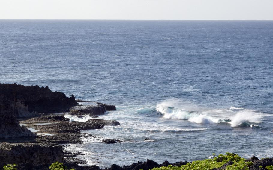 Cape Zanpa is an Okinawa tourist attraction known for its lighthouse, towering jagged cliffs and heaving swells.