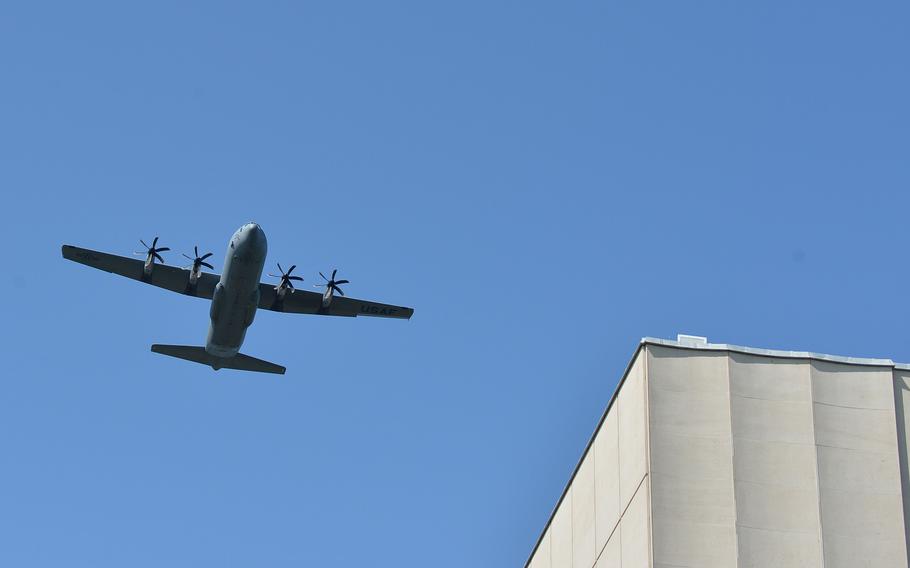 A C-130 from the 37th Airlift Squadron from Ramstein Air Base, Germany, flies over the Memorial Day ceremony at Lorraine American Cemetery in St. Avold, France, May 28, 2023.