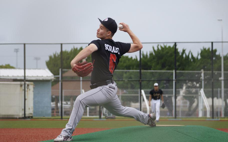 Colin Schrader, a senior at E.J. King High School on Sasebo Naval Base, Japan, pitches against Japanese players during a clinic at Yokosuka Naval Base south of Tokyo, May 12, 2024.