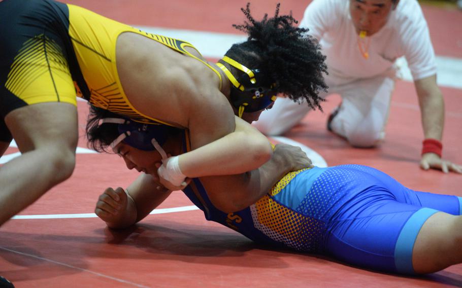 Kadena's 215-pounder Jeremiah Drummer repeated as a "Beast" champion, pinning St. Mary's Jimin Kim in 21 seconds.