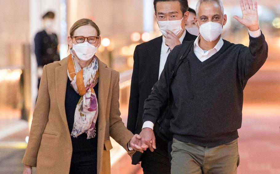 New U.S. Ambassador to Japan Rahm Emanuel and his wife, Amy Rule, arrive at Haneda International Airport in Tokyo, Sunday, Jan. 23, 2022. 