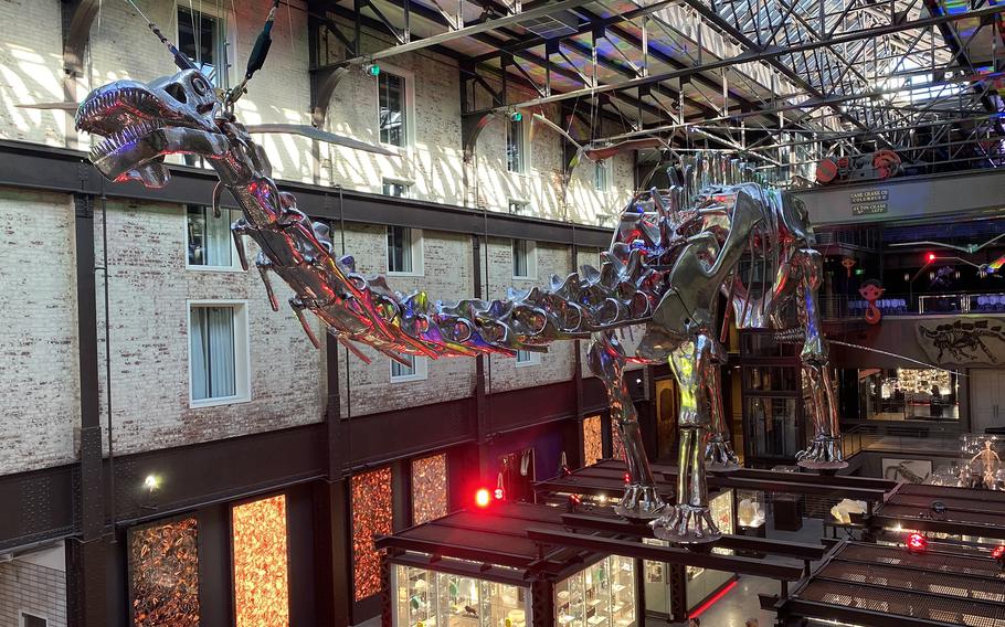 Chrome-dipped model dinosaur fossils dominate the interior of the JW Marriott Savannah Plant Riverside District.