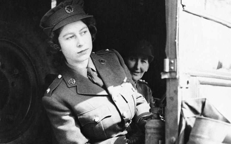 Britain’s then-Princess Elizabeth sits at the driving wheel of an ambulance in April 1945 after completing a course of driving instruction at the A.T.S. Center to be an officer. During WWII, young Princess Elizabeth briefly became known as No. 230873, Second Subaltern Elizabeth Alexandra Mary Windsor of the Auxiliary Transport Service No. 1. After months of campaigning for her parents’ permission to do something for the war effort, the heir to the throne enthusiastically learned how to drive and service ambulances and lorries. She rose to the rank of honorary Junior Commander within months.