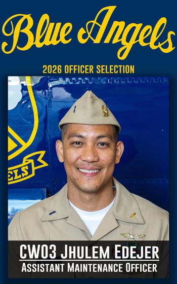 A service member smiles for a photo