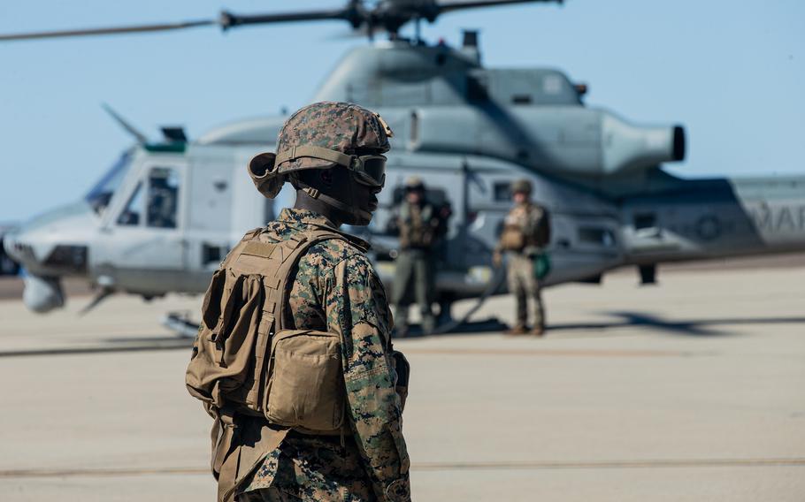 A U.S. Marine with Marine Wing Support Squadron 372, Marine Aircraft Group 39, 3rd Marine Aircraft Wing (MAW), getting ready to refuel during Exercise Winter Fury 21 on San Clemente Island, Calif., Feb. 16-19, 2021. The Winter Fury 22 exercise, the second such Marine Corps war game to be held in Moses Lake, Wash.,  is scheduled to last through Thursday, Feb. 3, 2022.