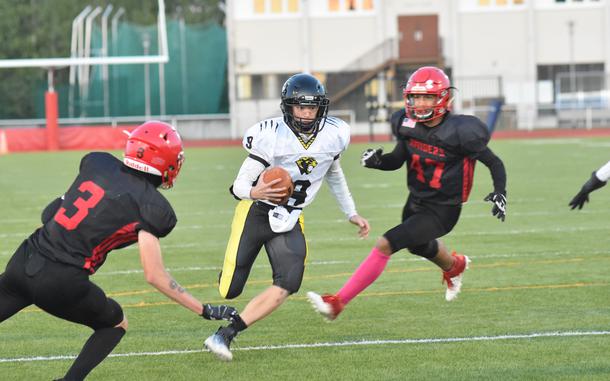 Stuttgart’s Caiden Ray looks for an opening while playing quarterback Friday, Sept. 30, 2022, against the Raiders in Kaiserslautern, Germany. The Panthers won 44-0.

