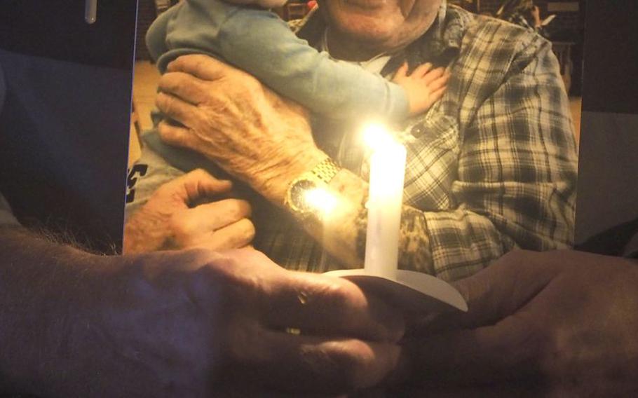 A Veterans Day Candlelight Vigil held in Edison, N.J., Nov. 11, 2020. Family members who lost loved ones during the pandemic that decimated the veterans home in Menlo Park attended the service.