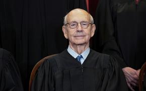 FILE - In this April 23, 2021, file photo, Supreme Court Associate Justice Stephen Breyer sits during a group photo at the Supreme Court in Washington. Breyer, the court’s eldest member at 83 and leader of its diminished liberal wing, has spoken for years about the danger of viewing the court as “junior league politicians.”  But he acknowledged it can be difficult to counter the perception that judges are acting politically, particularly after cases like the one from Texas in which the court by a 5-4 vote refused to block enforcement of the state’s ban on abortions early in pregnancy.(Erin Schaff/The New York Times via AP, Pool, File)