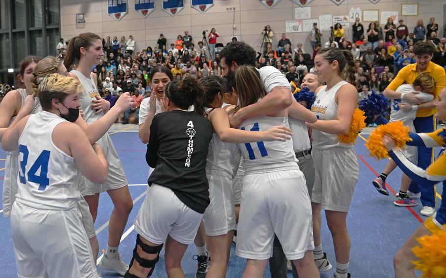 The Wiesbaden Warriors celebrate their 43-34 win over Ramstein in the Division I title game at the DODEA-Europe basketball championships in Ramstein, Germany, Feb. 18, 2023. 