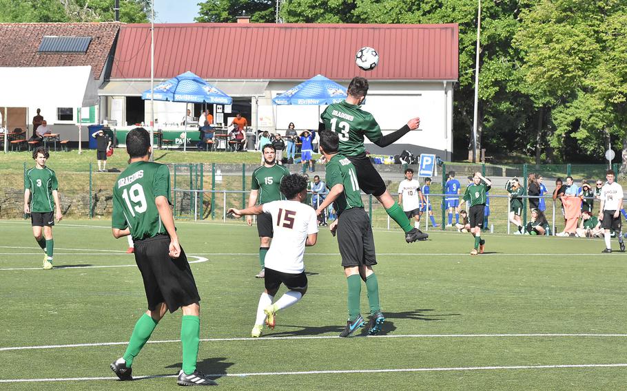 Alconbury's John Hayosh heads the ball Monday, May 16, 2022, at the DODEA-Europe boys Division III soccer chammpionships at Reichenbach, Germany.