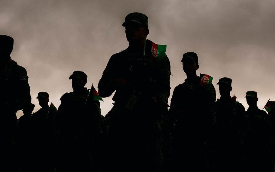 Afghan security forces parade in a base in Kabul in April, just months before the Taliban took over Afghanistan. 