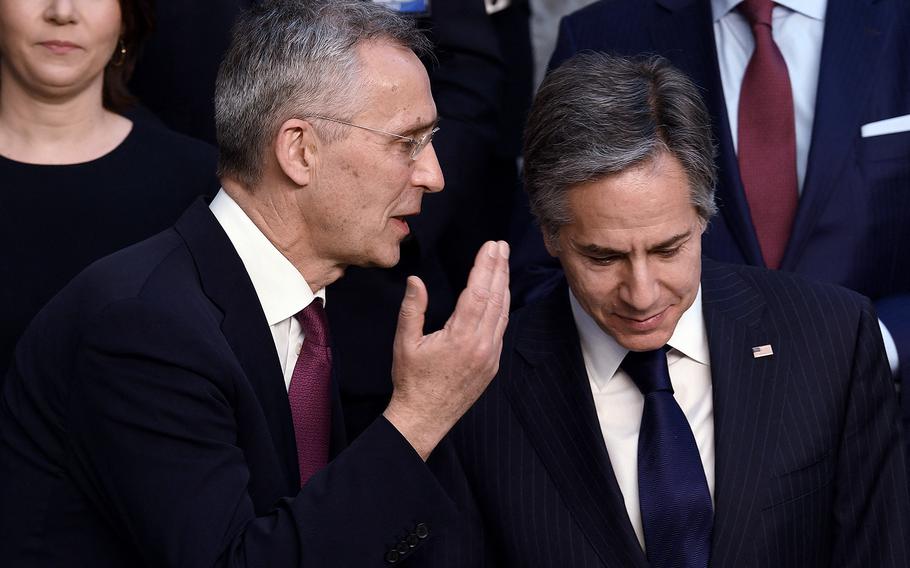 NATO Secretary General Jens Stoltenberg, left, speaks to U.S. Secretary of State Antony Blinken at NATO Headquarters in Brussels on March 4, 2022.  