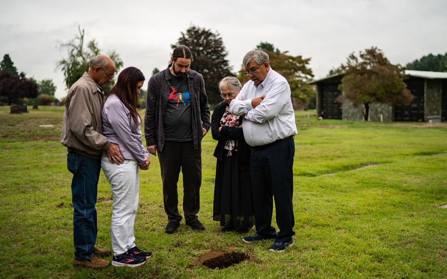 Relatives of Mary Sara pray at a Seattle cemetery in August after her brain, which had been returned by the Smithsonian, was buried near her existing grave. 