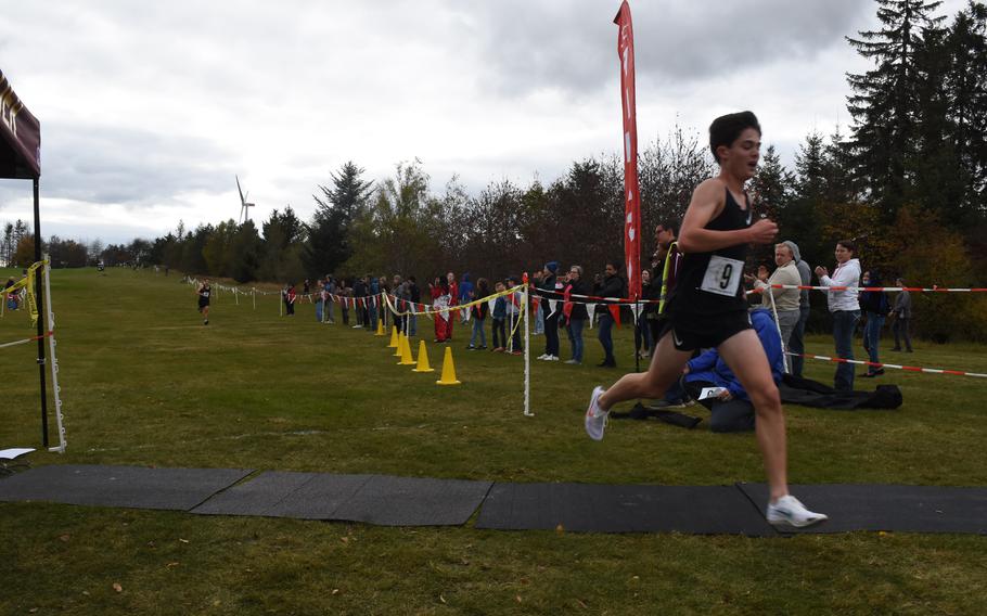 Stuttgart’s Carter Lindsey crosses the finish line first at the DODEA-Europe cross country championships on Saturday, Oct. 23, 2021, in Baumholder, Germany. Lindsey won the boys’ large-school division race in 16:40.78.