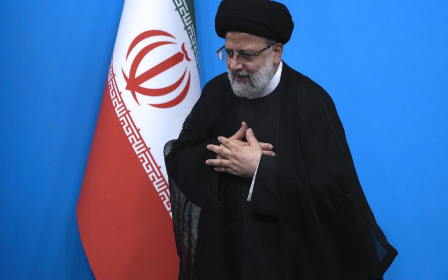 Iran President Ebrahim Raisi leaves after a news conference in Tehran, Aug. 29, 2023. 