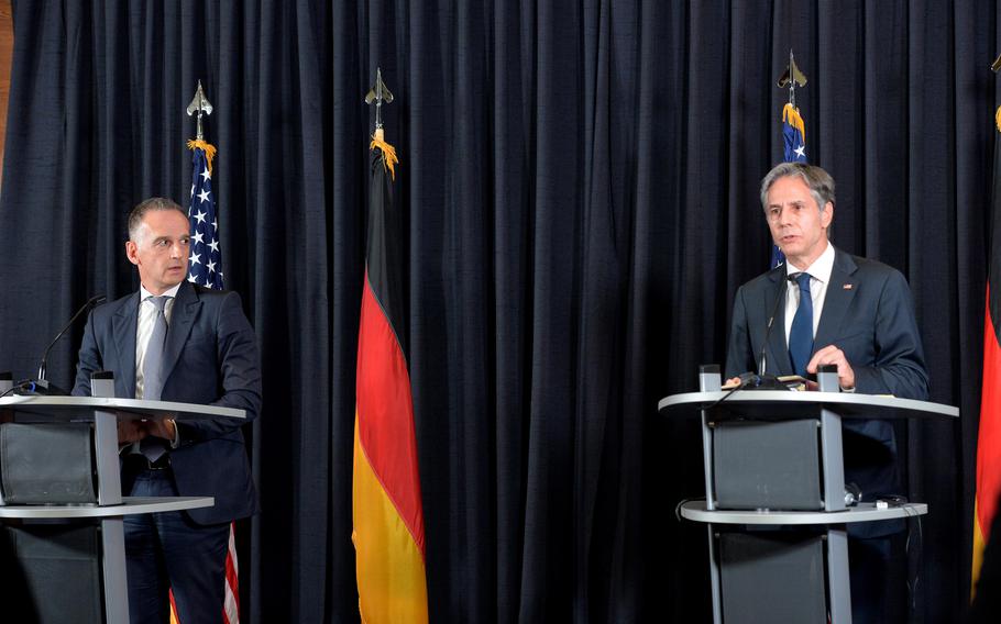 German Foreign Minister Heiko Maas, left, listens to his U.S. counterpart Secretary of State Antony J. Blinken answer a question at a press conference during their visit to Ramstein Air Base, Germany, Sept. 8, 2021. Blinken was at Ramstein to meet Afghan refugees, talk to U.S. service members and thank German Foreign Minister Heiko Maas and Germany for their help during the evacuation of tens of thousands of people from Afghanistan.