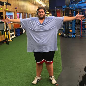 Josh Murphy takes a break at the gym in an undated photo, while in the process of losing 200 pounds to enlist in the Army. 