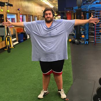 Josh Murphy takes a break at the gym in an undated photo, while in the process of losing 200 pounds to enlist in the Army. 