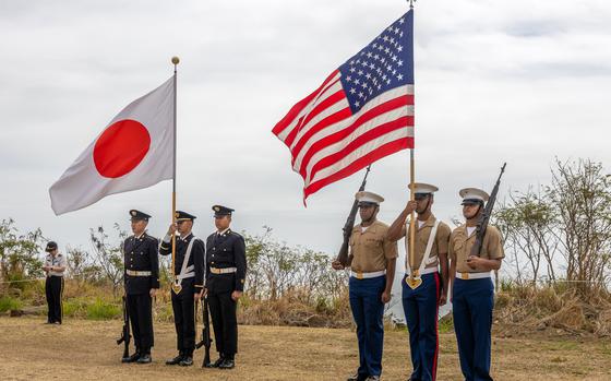 U.S. Marines and Japanese soldiers march during the Reunion of Honor ceremony on Iwo Jima, Japan, March 30, 2024. 