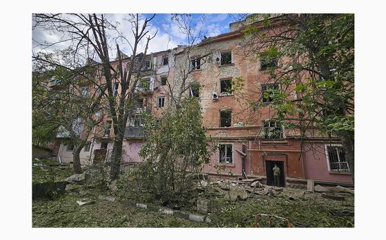 In this photo provided by Kherson Regional Military Administration, a destroyed apartment building is seen at the site of a Russian army attack with guided aerial bombs in Kherson, Ukraine, Wednesday, May 15, 2024. (Kherson Regional Military Administration via AP)