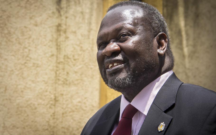 Riek Machar speaking to media.