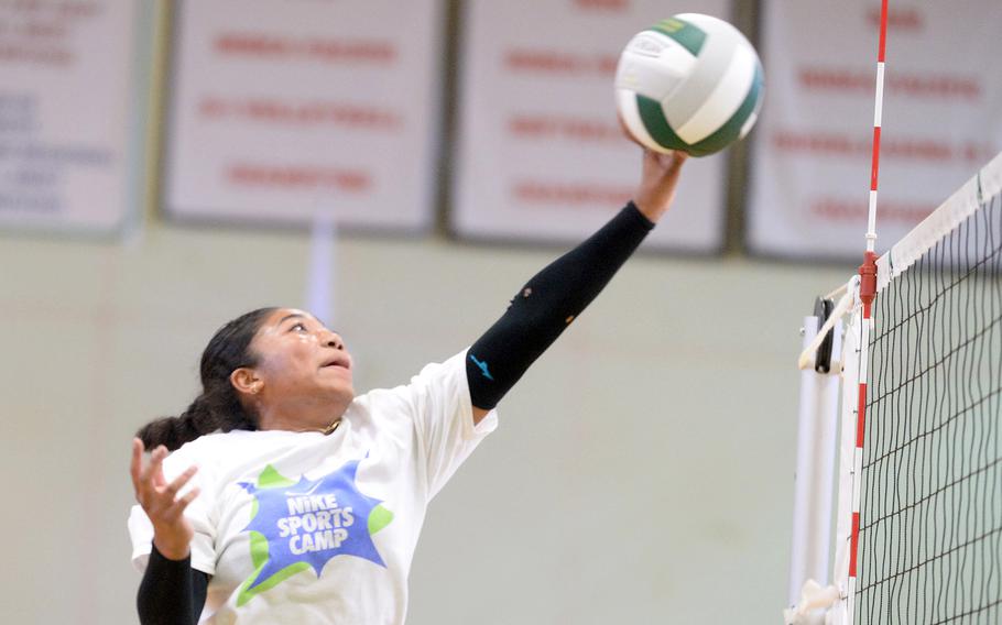 Senior Risha McGriff is one of six Kubasaki volleyball players, four of them starters, who've spent all four of their high school years in Dragons uniform.