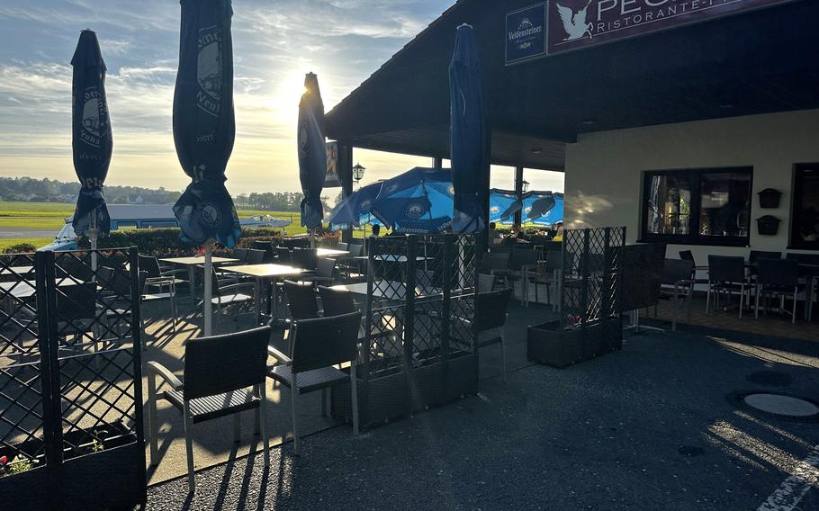 Outdoor seating at the Pegasus Pizzeria tends to fill up quickly. Reservations are recommended at the restaurant, which treats patrons to views of the planes using the airport in Weiden, Germany. 