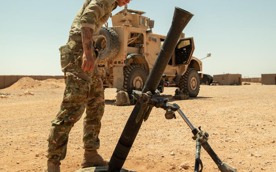 A soldier inspects a mortar at the al-Tanf garrison in Syria in August 2022. 