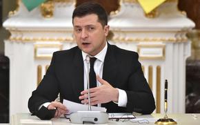 Ukraine President Volodymyr Zelenskyy gestures during his statement following talks with his Azerbaijanian counterpart Ilham Aliyev in Kyiv on Jan. 14, 2022. 