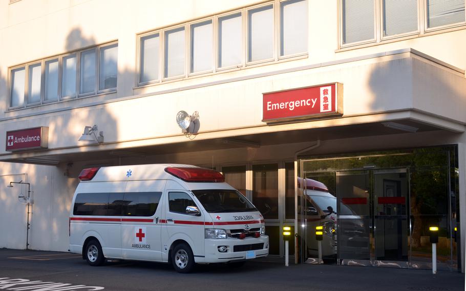 An ambulance parks outside U.S. Navy Hospital Yokosuka at Yokosuka Naval Base, Japan, Friday, Sept. 30, 2022. 