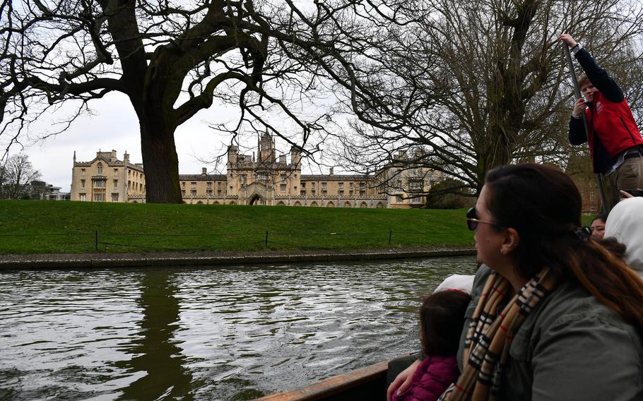 Kelly and Penelope Alvarez look at Cambridge University from aboard a punting boat on the River Cam in Cambridge, England, on Feb. 17, 2024. 