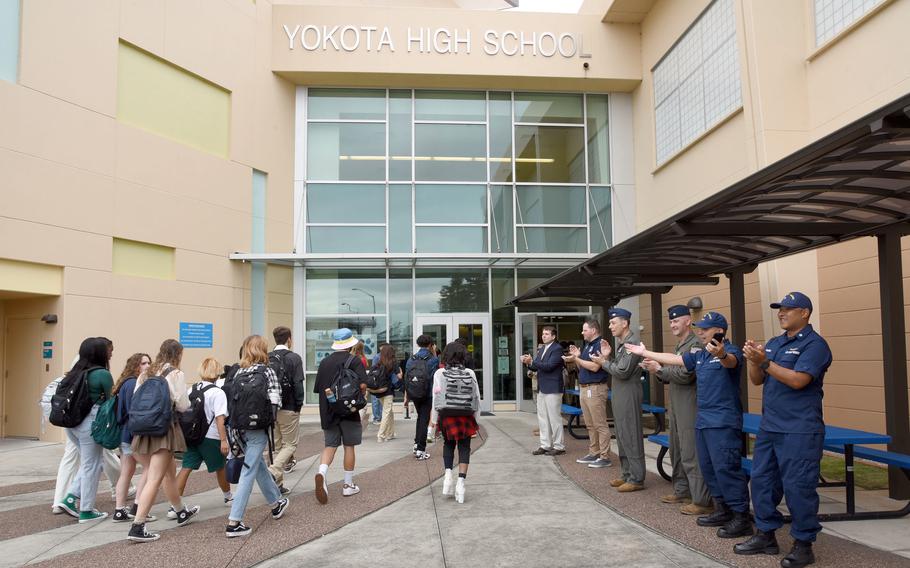 Students are welcomed back to Yokota High School on the first day of classes at Yokota Air Base, Japan, Monday, Aug. 22, 2022. 