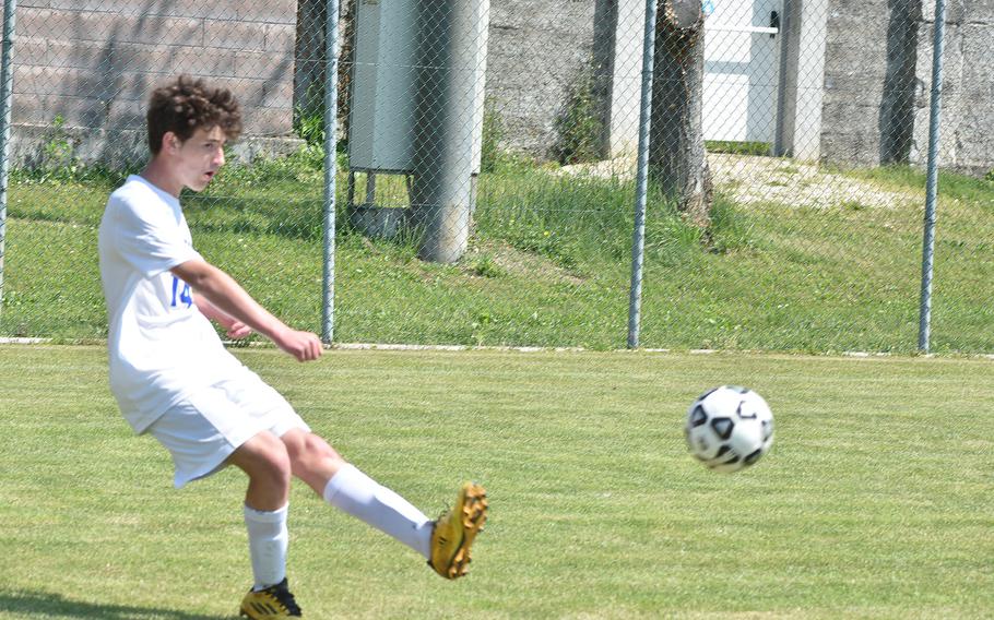 Sigonella's Gabriell Naselli attempts a crossing pass Saturday, April 30, 2022, against the Aviano Saints in Aviano, Italy.