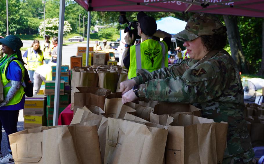 A woman with paper bags.