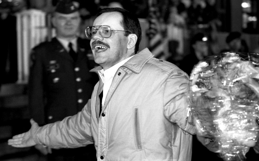 Wiesbaden, Germany, December 5, 1991:  Associated Press correspondent Terry Anderson, held captive in Lebanon for 6½ years, acknowledges the cheers of the crowd that greeted him at the Wiesbaden Air Force hospital in Wiesbaden, Germany, Dec. 5, 1991, after his release.