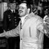 Wiesbaden, Germany, December 5, 1991:  Associated Press correspondent Terry Anderson, held captive in Lebanon for 6½ years, acknowledges the cheers of a crowd that greeted him at the Wiesbaden Air Force hospital after his release. The end of Anderson's 2,455-day ordeal was made even happier by his first meeting with his daughter, Sulome, who was born three months after his capture.