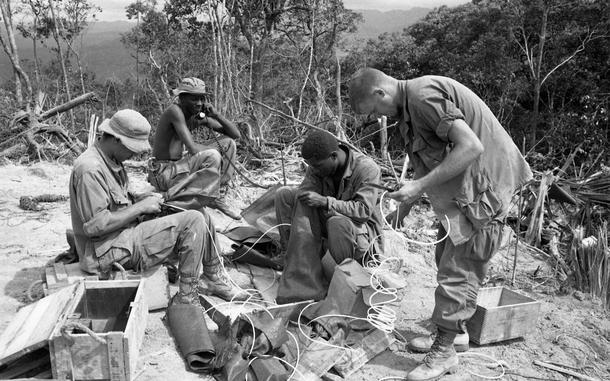 Hed: Fixing to blow, 1968

A Shau area, South Vietnam, Aug. 9, 1968: Engineers - taking part in Operation Somerset Plain, fix dynamite to blow up trees on top of a hill for landing zone. 

Looking for Stars and Stripes’ coverage of the Vietnam War? Subscribe to Stars and Stripes’ historic newspaper archive! We have digitized our 1948-1999 European and Pacific editions, as well as several of our WWII editions and made them available online through https://starsandstripes.newspaperarchive.com/

META TAGS: Vietnam war; combat; Army; war; Operation Somerset Plain; engineers; deforestation; servicemember; explosives; African American