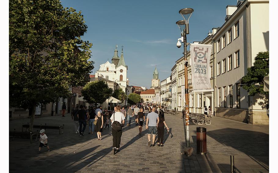 A lamppost in the center of Lublin, Poland, where investigators say recruits working for Russia posted anti-Ukraine fliers and stickers. They have since been removed.