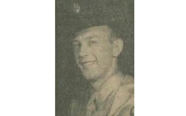 A photo of a service member in his uniform