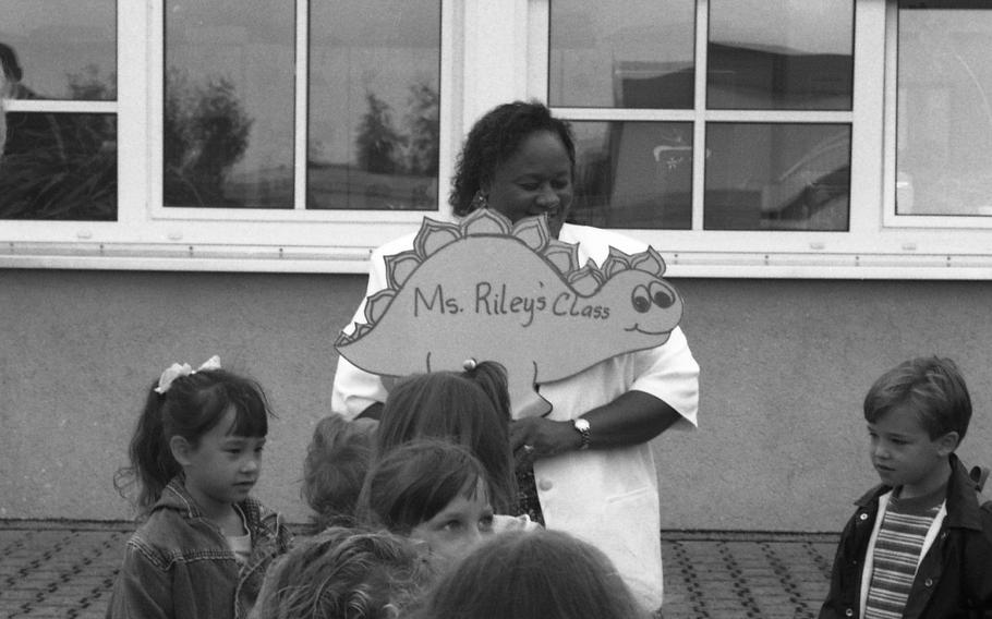 B.J. Riley gets her second-grade class in line before taking them in for the first day at Bad Kreuznach Elementary School in Germany on Aug. 29, 1995.