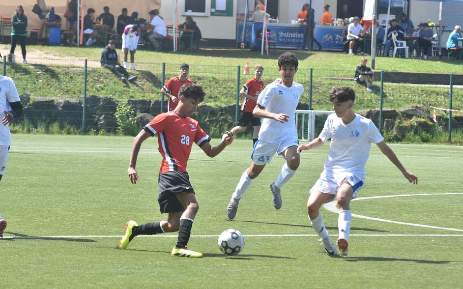 American Overseas School of Rome's Rayan Ranieri tries to get the ball past Marymount's Zolta Scantoi at the DODEA European Division II boys soccer championships Wednesday, May 22, 2024, in Reichenbach-Steegen, Germany.