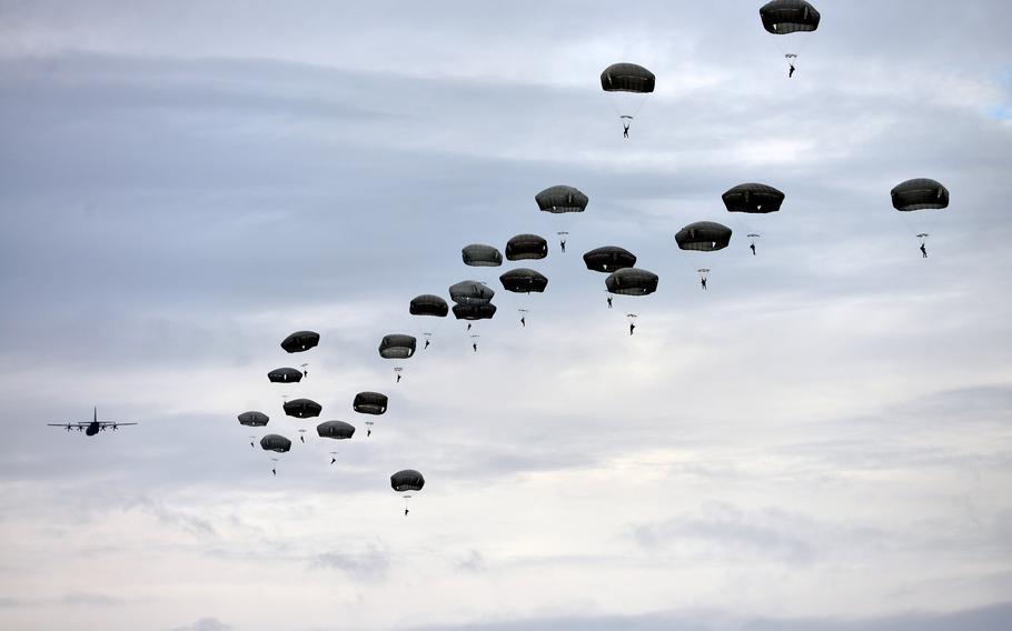 U.S. Army paratroopers from the 173rd Airborne Brigade and Serbian counterparts descend toward the Baku drop zone near Belgrade, Serbia, in 2017 after jumping from a pair of C-130 aircraft.