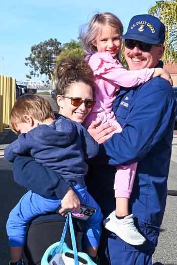 Family and friends celebrate as the U.S. Coast Guard Cutter Waesche (WMSL 751) crew returns to homeport in Alameda, Calif., Dec. 9, 2023. 