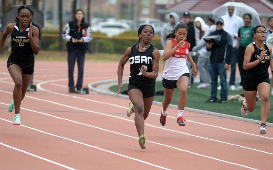 Osan freshman Tristin Payne led the way to victory in the girls 100-meter dash during Saturday’s  KAIAC and DODEA-Korea track finals.