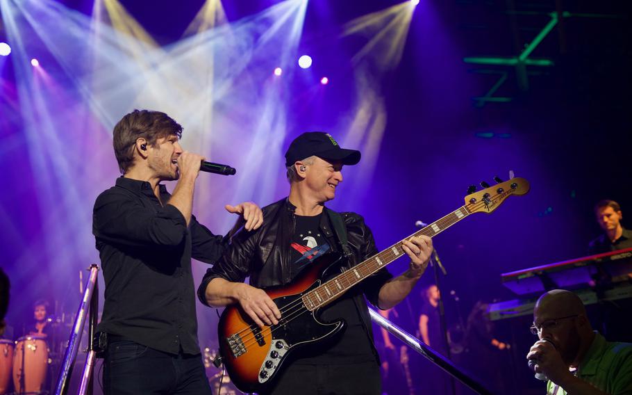 Vocalist Jeff Vezain, left, and Gary Sinise perform with The Lt. Dan Band at Sunbelt Rentals in Washington, D.C., Jan. 31, 2018.