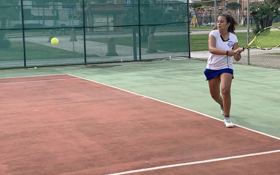 Charlize Caro of the Sigonella Jaguars prepares to hit the ball in the DODEA-Europe South tennis finals at Naval Support Activity Naples' Gricignano di Aversa site on Saturday, Oct. 23 2021. Caro, 14, won her semifinal match but lost the girls singles final to Naples' Aleigh Lamis. 