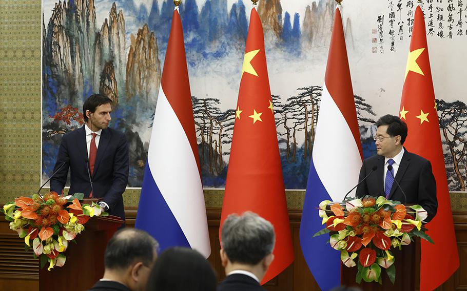 Dutch Deputy Prime Minister and Foreign Minister Wopke Hoekstra, left, and his Chinese counterpart Qin Gang attend a briefing in Beijing on Tuesday May 23, 2023. 